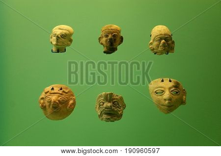 Pre Columbian indigenous pottery faces from Colombia
