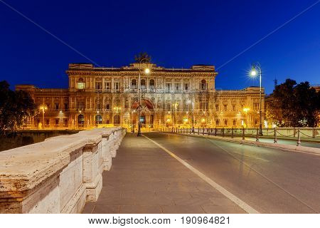 Night view of the Palace of Justice and the Umberto Bridge across the Tiber River. Rome. Italy.