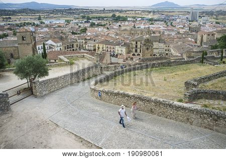 Trujillo Spain - June 4 2017: Tourists ascending from downtown to Castle of medieval Trujillo town. Caceres Extremadura Spain