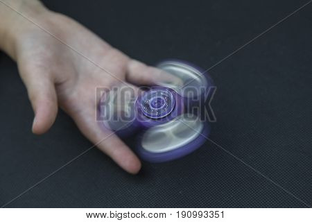 A fidget spinner popular toy for increased focus stress relief.
