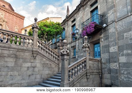 Beautiful ancient stairs at old Spanish village (Poble espanyol)