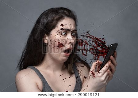 The Concept Of Insecurity, Spam, Social Problems, Violence .a Young Girl With A Frightened Face, See