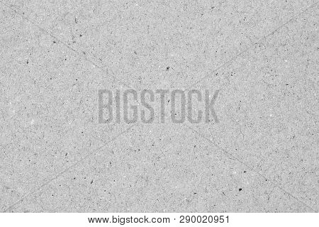 Paper Texture Cardboard Texture Close-up. Recyclable Material, Has Small Inclusions Of Cellulose