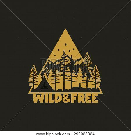 Hand Drawn Travel Badge With Camp Tent, Mountains, Pine Trees Forest And Quote - Wild And Free. Old 