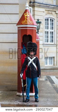 Copenhagen, Denmark - June, 2018: Royal Guard At Amalienborg. The Palace And Residence In Copenhagen