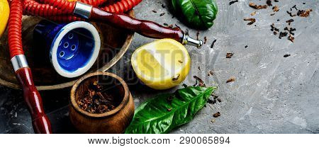 Smoking Hookah With Lemon Flavor