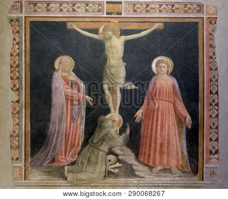 FLORENCE, ITALY - JANUARY 10, 2019: Crucifixion with the Virgin, Saint Francis and Saint John the Evangelist, by Andrea di Giusto, Basilica di Santa Croce (Basilica of the Holy Cross) in Florence