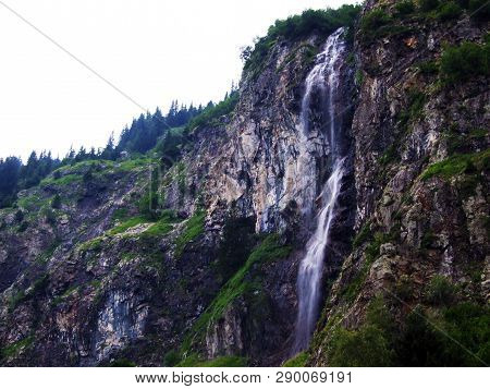 Waterfall Sidensackfall Or Wasserfall Sidensackfall, Spritzbach Stream In The Alpine Valley Of Mader