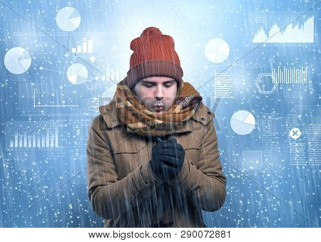 Young businessman shivering with graphs, reports and chart concept