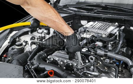 Car Detailing Maintenance. Cleaning Engine With Hot Steam. High Pressure Washing. Washing At The Sta