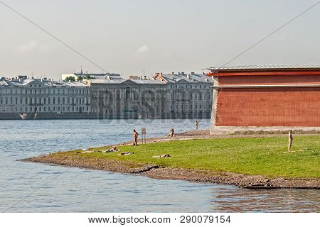 Saint Petersburg, Russia, July 18: Citizens Relax On The Shore At The Mouth Of Malaya Nevka Near The