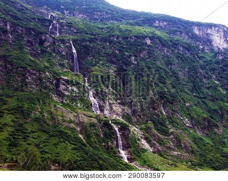 Waterfall Lammerbachfall Or Wasserfall Lammerbachfälle, Lammerbach Stream In The Alpine Valley Of Ma