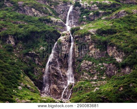 Waterfall Lammerbachfall Or Wasserfall Lammerbachfälle, Lammerbach Stream In The Alpine Valley Of Ma