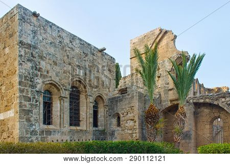Ruins Of The Abbey Of Bellapais In The Northern Cyprus. Bellapais Abbey Is The Ruin Of A Monastery B