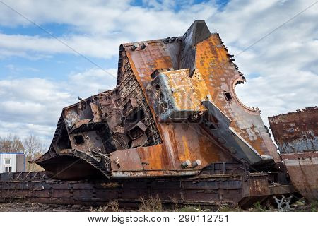 Huge Rusty Pieces Of Decommissioned Marine Ship That Was Cut And Left On The Shore.
