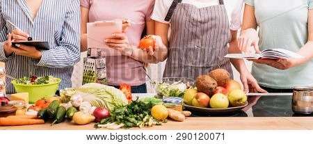 Cooking Classes. Food Preparing Hobby. Group Of Women Learning Healthy Eating Lifestyle And Balanced