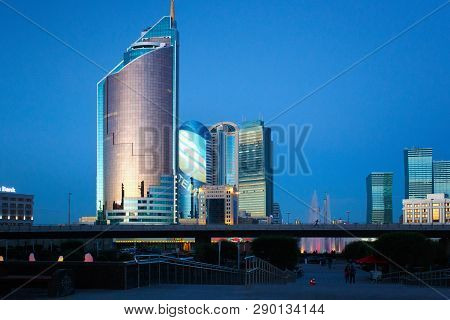 Astana, Kazakhstan - July 25, 2017: Evening View Of The Modern High-rise Buildings The Center Of Ast