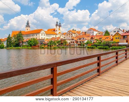 Telc Panorama. Water Reflection Of Houses And Telc Castle, Czech Republic. Unesco World Heritage Sit