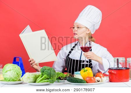 Culinary Expert. Chef Cooking Healthy Food. Girl Read Book Best Culinary Recipes. Culinary School Co