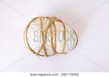 Anatomical Model Of Human Brain, Strongly Tied Around With Rope On White Background. Visualization C