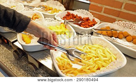 Yellow Chips In The Self-service Restaurant