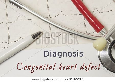 Cardiac Diagnosis Of Congenital Heart Defect. On Doctor Workplace Is Paper Medical Documentation, Wh