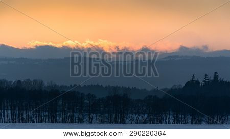 Beautiful Winter Sunset In The Mountain Valley.