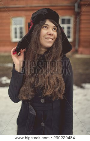 Portrait Of A City Girl In A Blue Jacket. Girl Walking In The Fresh Air