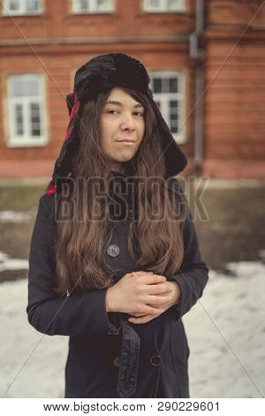 Portrait Of A City Girl In A Blue Jacket. Girl Walking In The Fresh Air