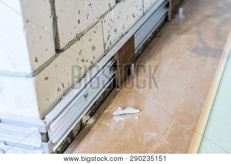 Installation Of Hidden Skirting Board At The Initial Stage Of Finishing Works. Home Repair.