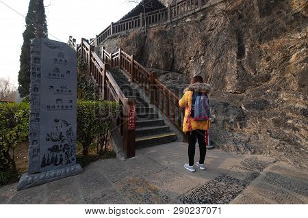 Luoyang, Henan/china- January 19, 2019: The Unspecific Women Taking Photo At The Longmen Grottoes. T