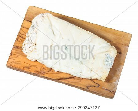 Top View Of Piece Of Local Italian Gorgonzola Soft Blue Cheese On Olive Wood Cutting Board Isolated 