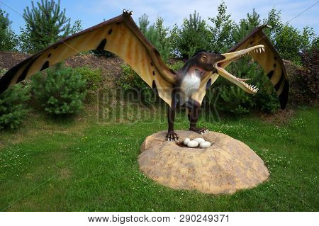 Leba, Poland - July 23, 2012: Model of dinosaur-pterodactyl in Jurassic park. Cearadactylus (frightfull finger). Wingspan 5,5 m, weight 15 kG.                                                      
