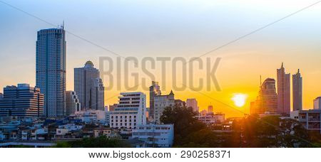 Sunset Of City Tower On Landscape ,in Light Sky