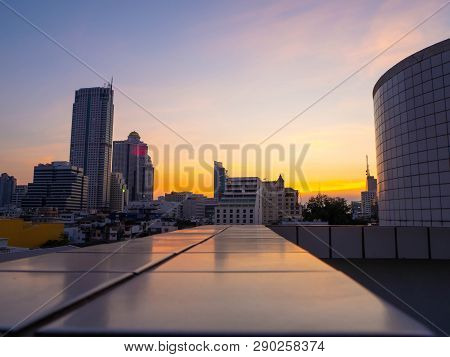 Sunset Of City Tower On Landscape ,in Light Sky