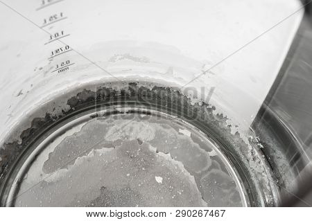 Limescale At The Bottom Of Kettle - Hard Water And Calcium Concept