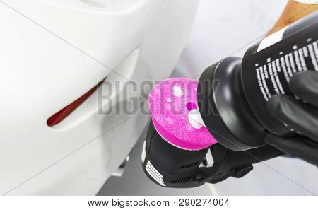 Car Polish Wax Worker Hands Holding Polisher And Polish. Close Up At Hand Holding Car Polisher. Man 