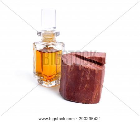 Chandan Or Red Sandalwood Piece Isolated On White Baclground. With Essential Oil