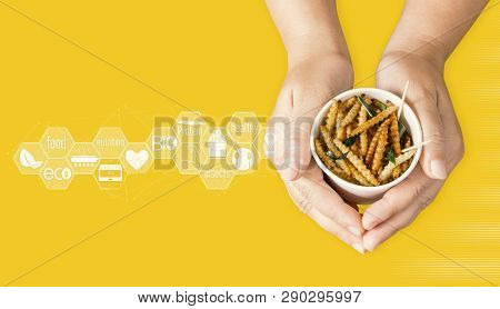 Bamboo Worm For Eating As Food Insects In Disposable Cup On Woman's Hand And Icon Nutrition Media. B