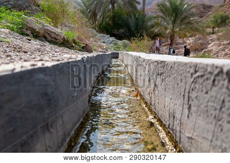 Irrigation Canal Called Falaj In Muscat Neighborhood, Oman