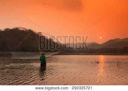 Villagers Are Catching Fish By Fish Trap (net Trap) In Reservoir