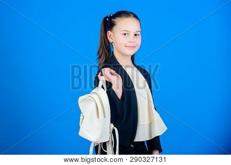Shopping Time. Cute Child Holding Bag On Blue Background. Little Girl Going Shopping With Daypack Ba