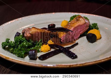 Dish On A Elegant Plate With Wegetables