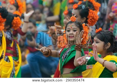 Kolkata, India - March 1, 2018 : Young Girl Dancers Dressed In Yellow And Green Coloured Sari - Trad