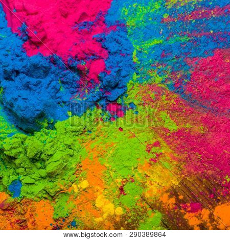 Holi Colorful festival of colored paints of powders and dust. colorful background. Holiday bright colors for the entertainment