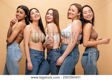 Five Cheerful Multicultural Women Smiling And Posing At Camera Isolated On Beige, Body Positivity Co