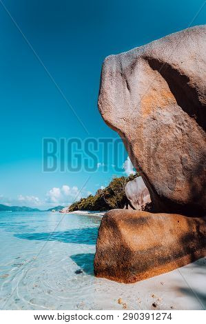 Huge Beautifully Shaped Bizarre Granite Boulders In Eveninf Light At Famous Anse Source Dargent Beac