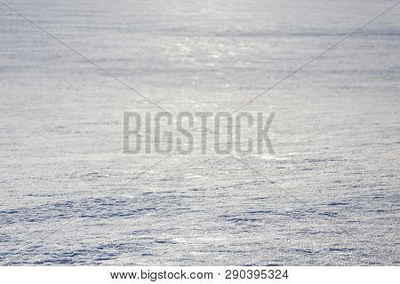 Distant Snow Field Plain Seasonal Texture Background With Selective Focus