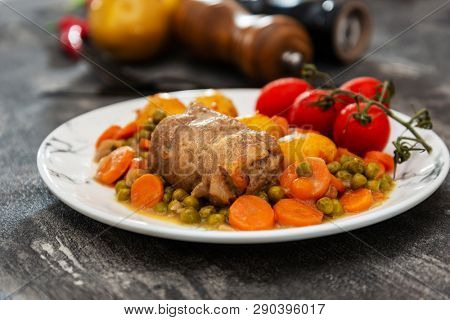 Beef meat stewed with potatoes-Traditional French cuisine Beef Bourguignon potatoes carrots in persillade