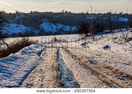 Rustic Road Track At Winter Thaw Daylight With Nobody And Selective Focus